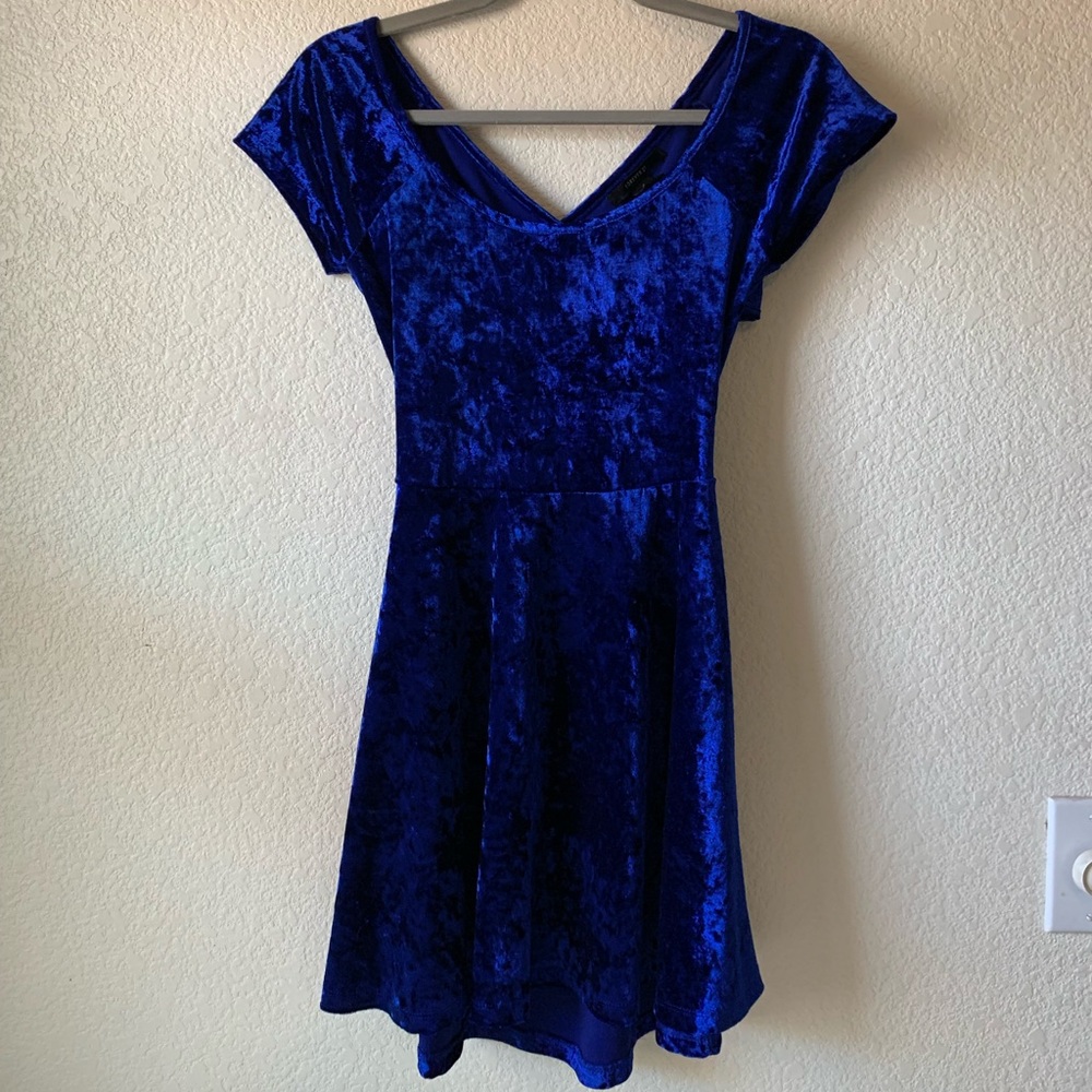 Blue velvet skater dress with cutout back